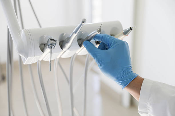 Professional Tooth Extraction technician working in Midlothian, TX